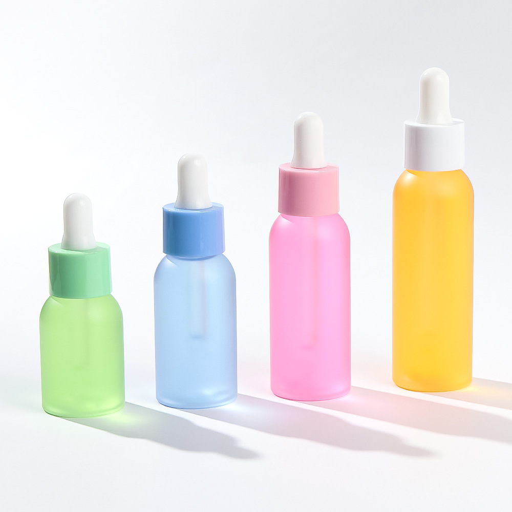 Bouteille d'huile essentielle de macaron de 30ml 40ml 50ml 60ml 80ml, cylindre coloré, distribution de liquide d'essence givrée écologique Bouteille d'huile essentielle de macaron de 30ml 40ml 50ml 60ml 80ml, cylindre coloré, distribution de liquide d'essence givrée écologique