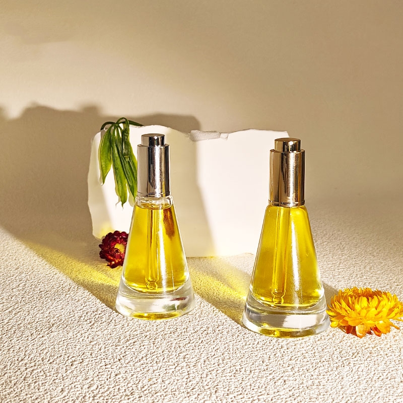 Bouteille d'huile essentielle compte-gouttes cosmétique en verre conique