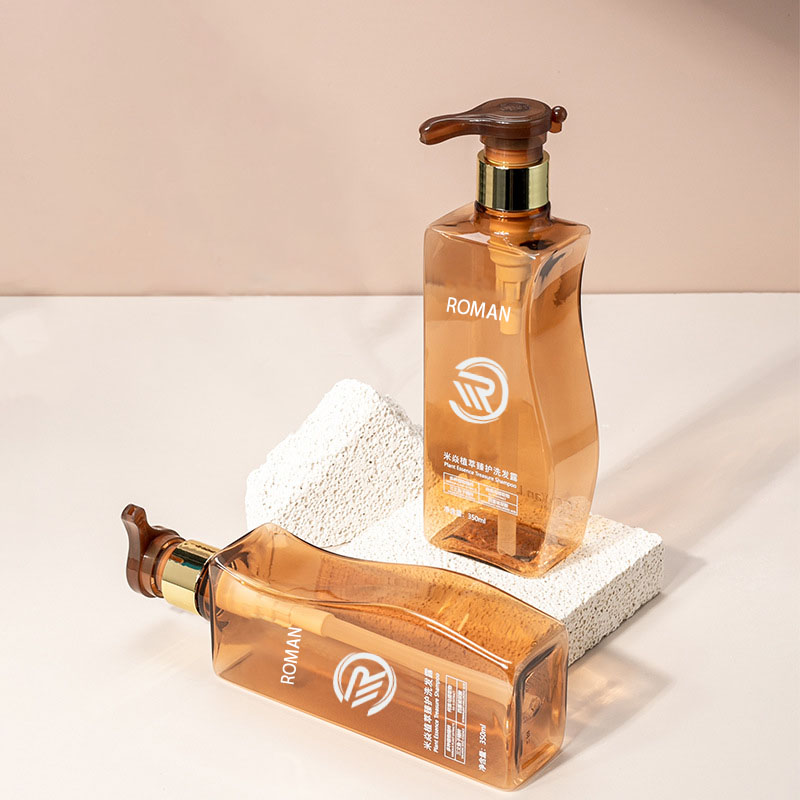 Bouteille de lotion pour le corps vide en plastique pour animaux de compagnie ambre en forme de courbe fiable de 350 ml 500 ml avec pompe pour le soin des cheveux, shampoing, revitalisant ou crème pour le visage Bouteille de lotion pour le corps vide en plastique pour animaux de compagnie ambre en forme de courbe fiable de 350 ml 500 ml avec pompe pour le soin des cheveux, shampoing, revitalisant ou crème pour le visage